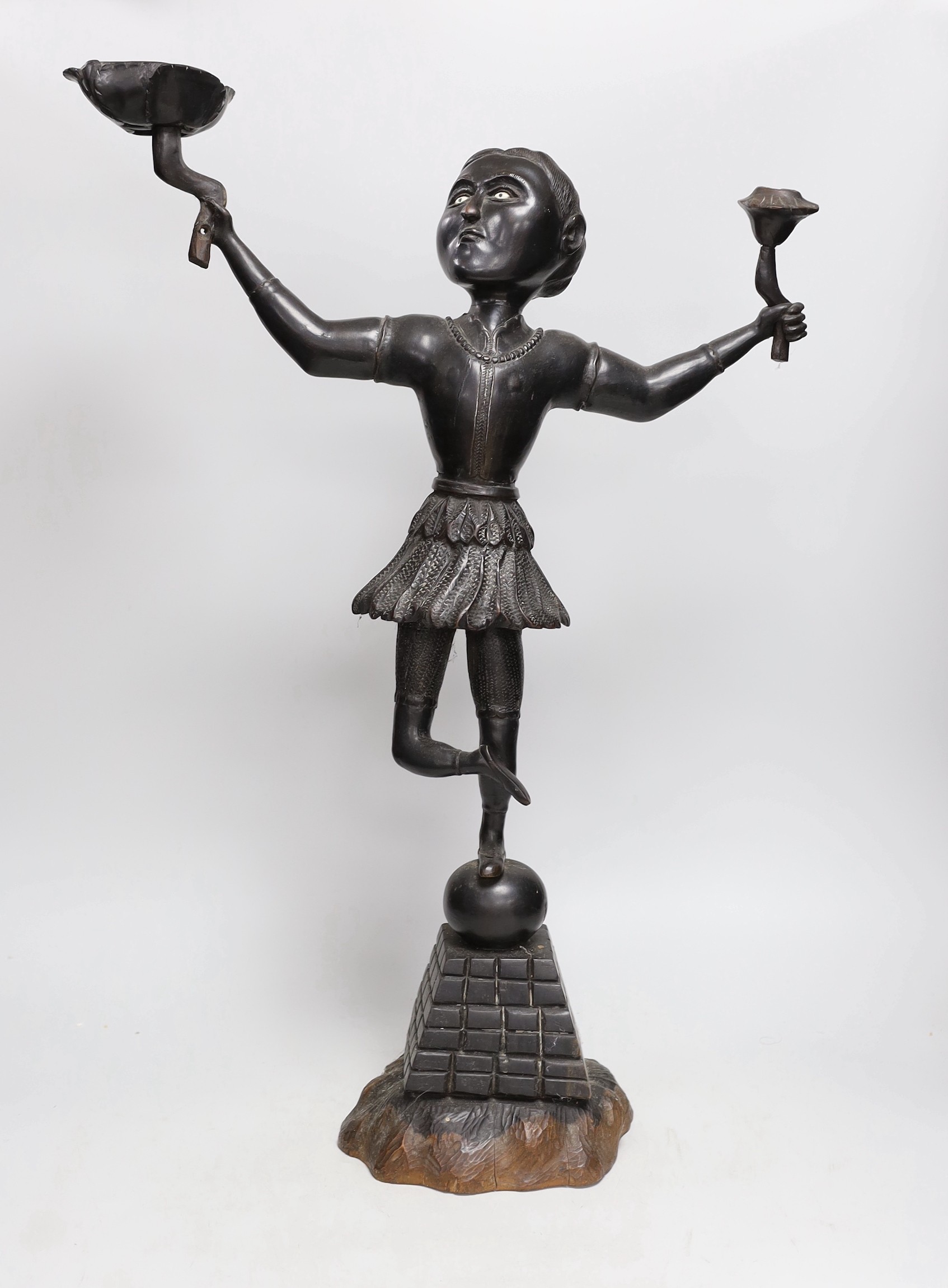 An unusual 19th century Ceylonese carved ebony figure, 91cm high